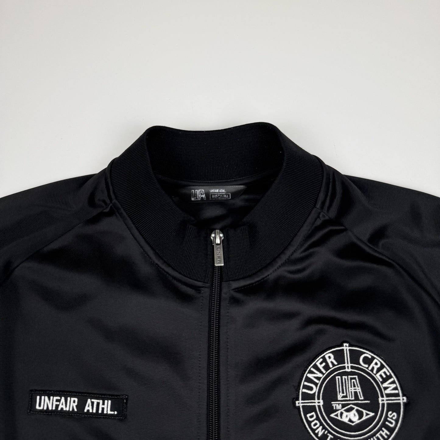 Unfair Athletics Trainingsjacke Schwarz (M)