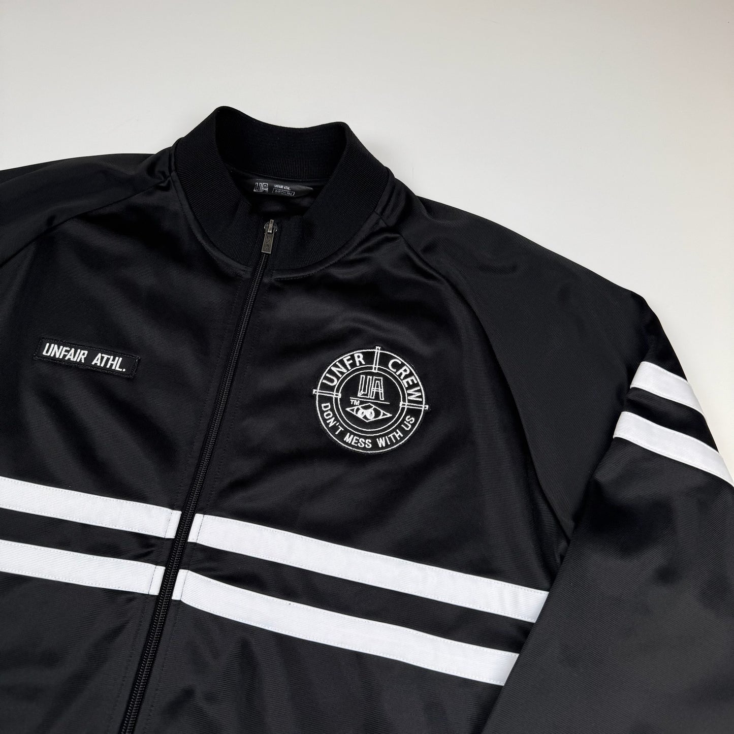 Unfair Athletics Trainingsjacke Schwarz (M)